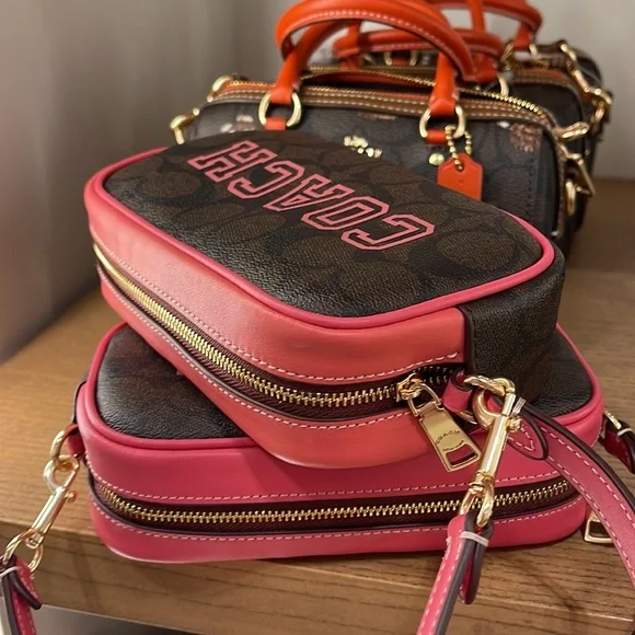 Coach Jamie Wristlet In Signature Canvas With Varsity Motif
IM/Brown/Watermelon - Picture 14 of 16